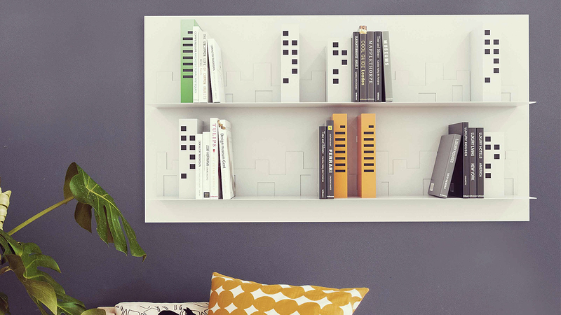 Illustration for article titled A Skyscraper Shelf Turns Your Books Into a Picturesque Skyline